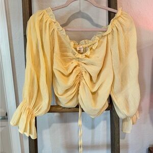 A Peach yellow blouse